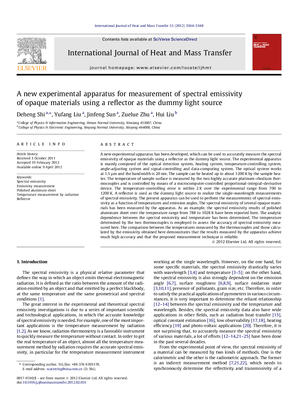 A new experimental apparatus for measurement of spectral emissivity of opaque materials using a reflector as the dummy light source