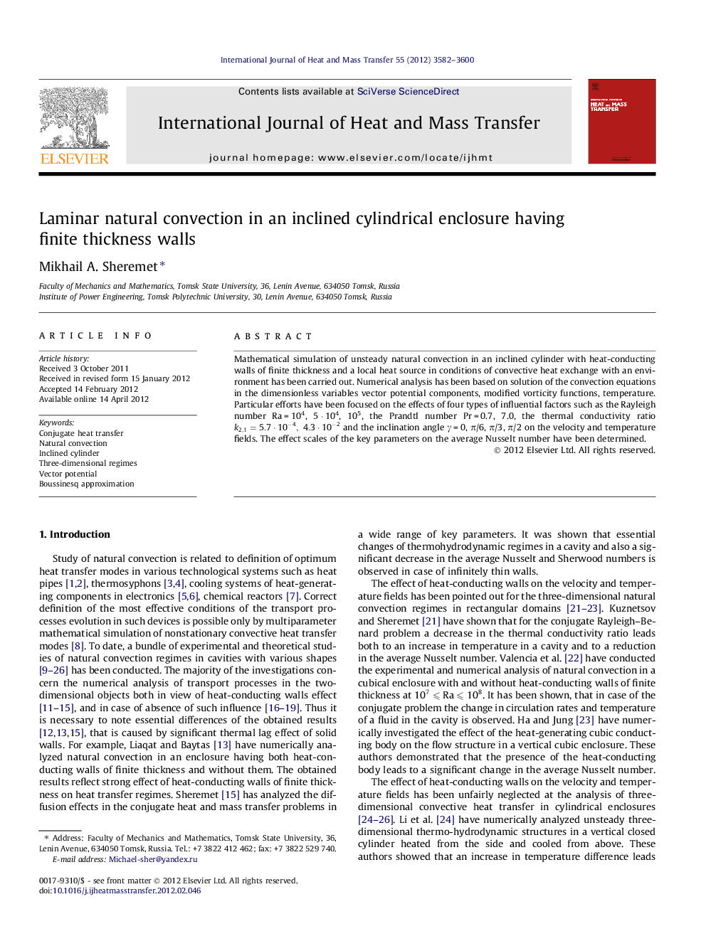 Laminar natural convection in an inclined cylindrical enclosure having finite thickness walls