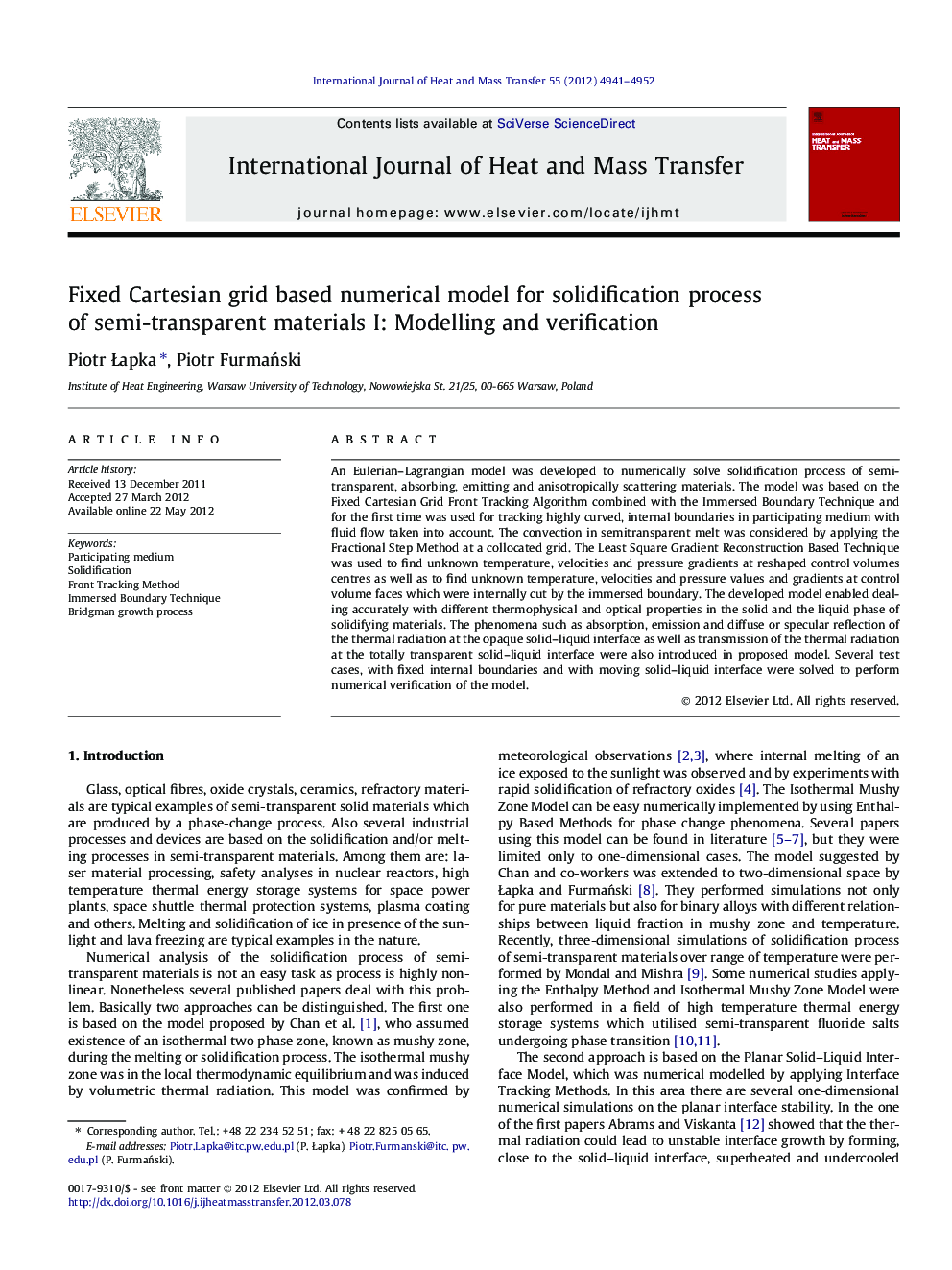Fixed Cartesian grid based numerical model for solidification process of semi-transparent materials I: Modelling and verification