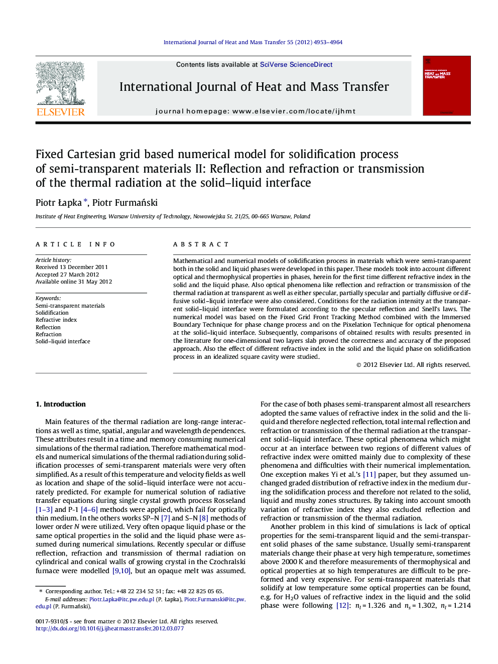 Fixed Cartesian grid based numerical model for solidification process of semi-transparent materials II: Reflection and refraction or transmission of the thermal radiation at the solid-liquid interface