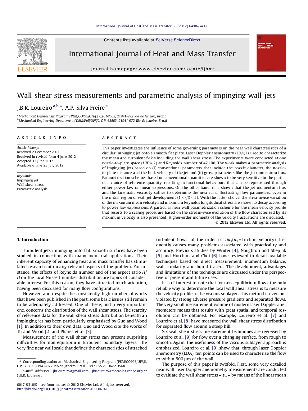 Wall shear stress measurements and parametric analysis of impinging wall jets