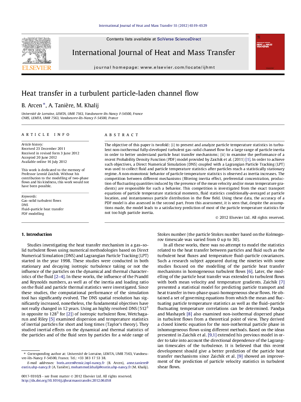 Heat transfer in a turbulent particle-laden channel flow