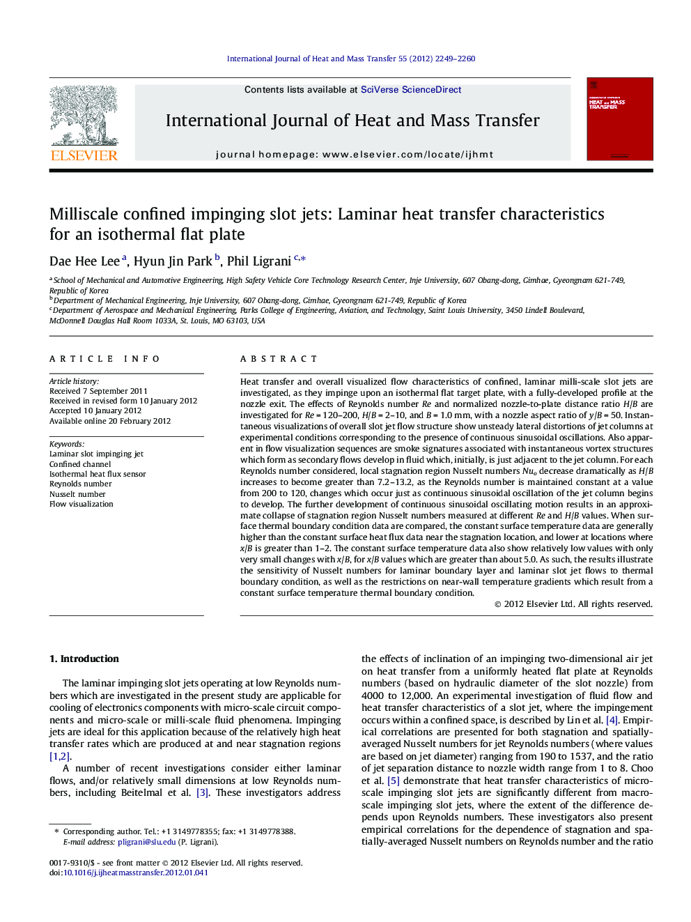 Milliscale confined impinging slot jets: Laminar heat transfer characteristics for an isothermal flat plate