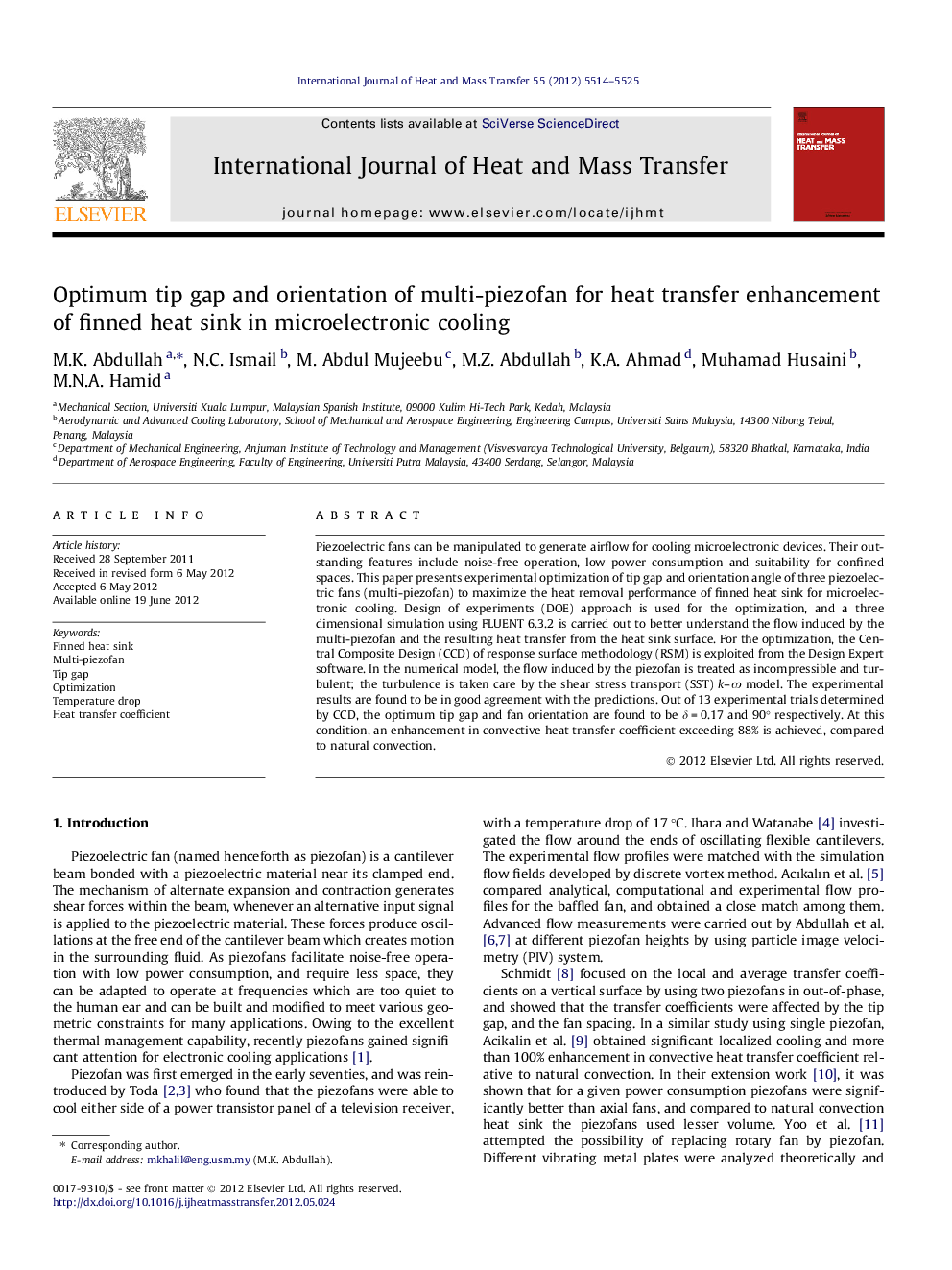 Optimum tip gap and orientation of multi-piezofan for heat transfer enhancement of finned heat sink in microelectronic cooling