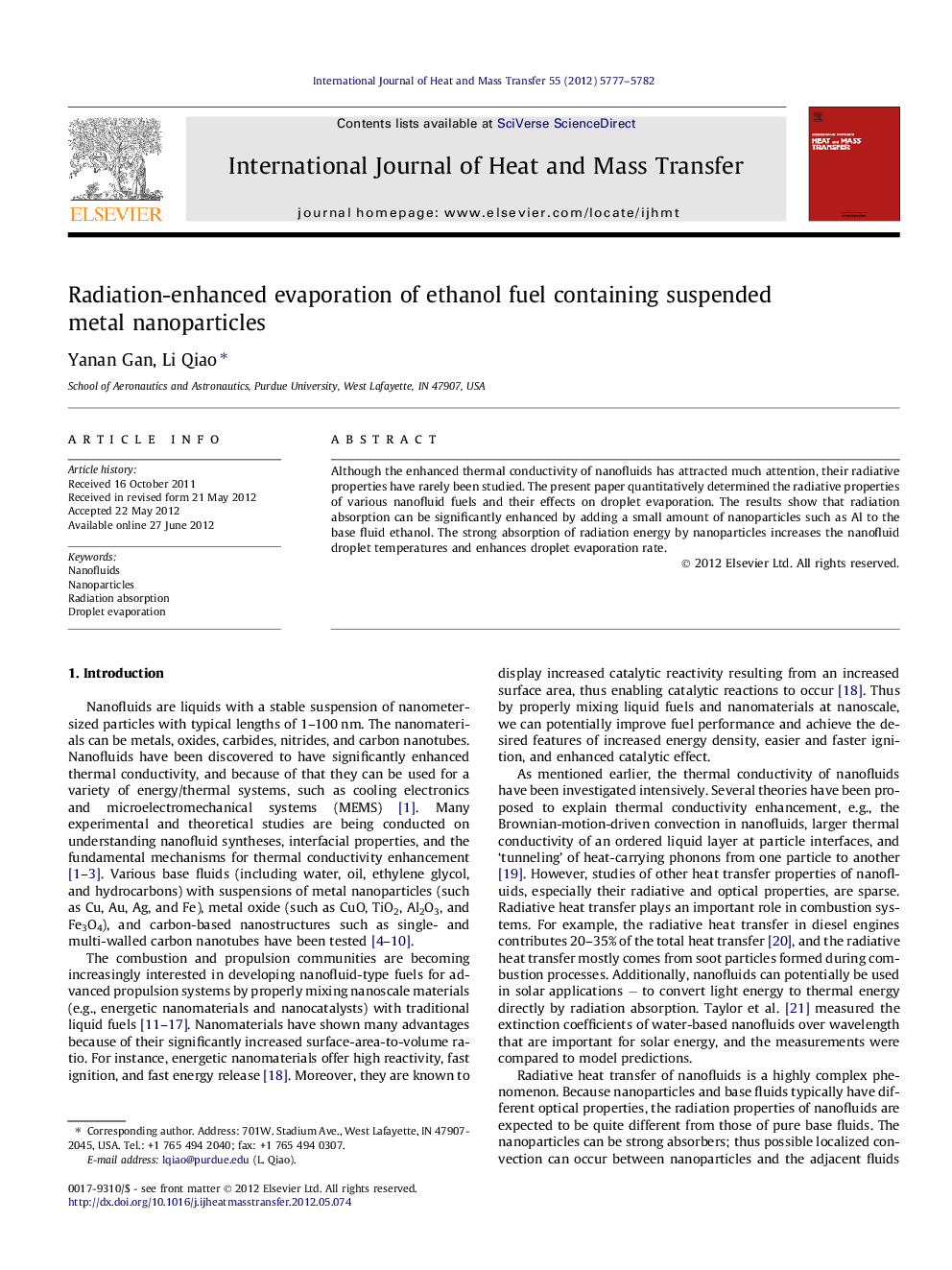 Radiation-enhanced evaporation of ethanol fuel containing suspended metal nanoparticles