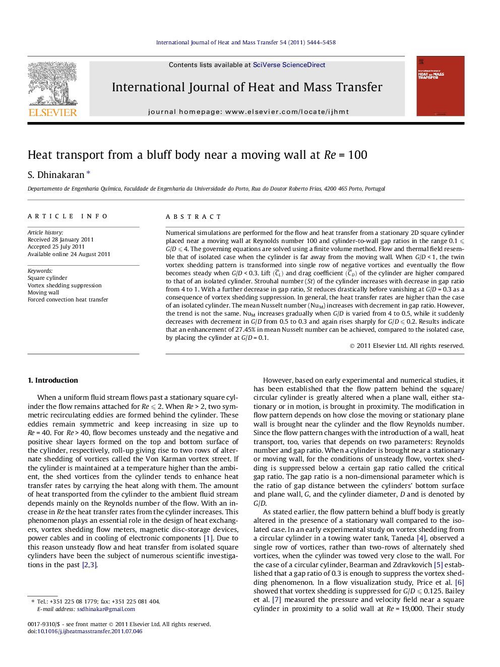 Heat transport from a bluff body near a moving wall at Re = 100