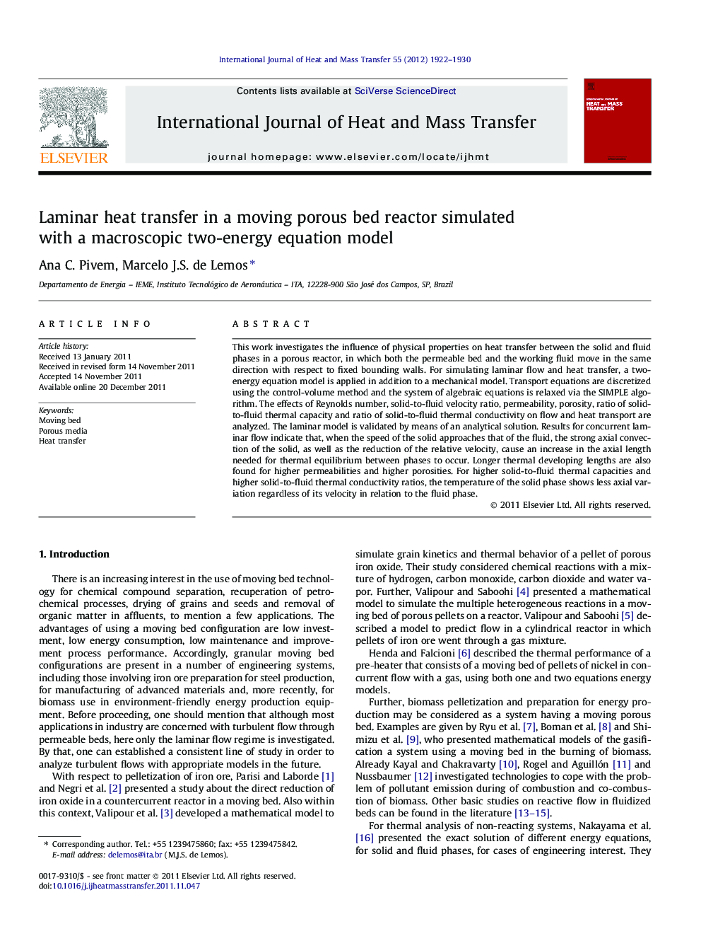 Laminar heat transfer in a moving porous bed reactor simulated with a macroscopic two-energy equation model