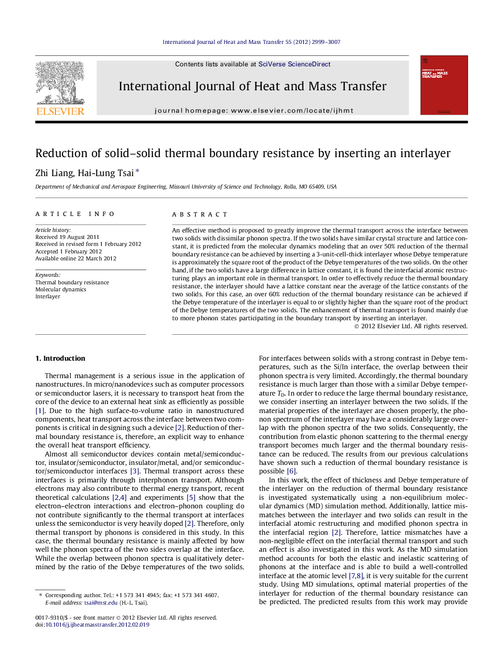 Reduction of solid-solid thermal boundary resistance by inserting an interlayer