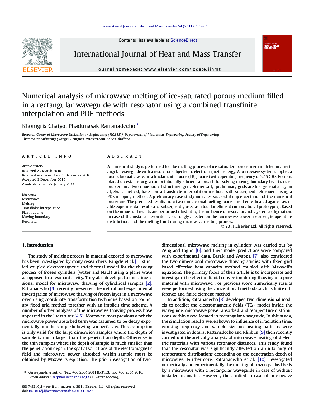 Numerical analysis of microwave melting of ice-saturated porous medium filled in a rectangular waveguide with resonator using a combined transfinite interpolation and PDE methods