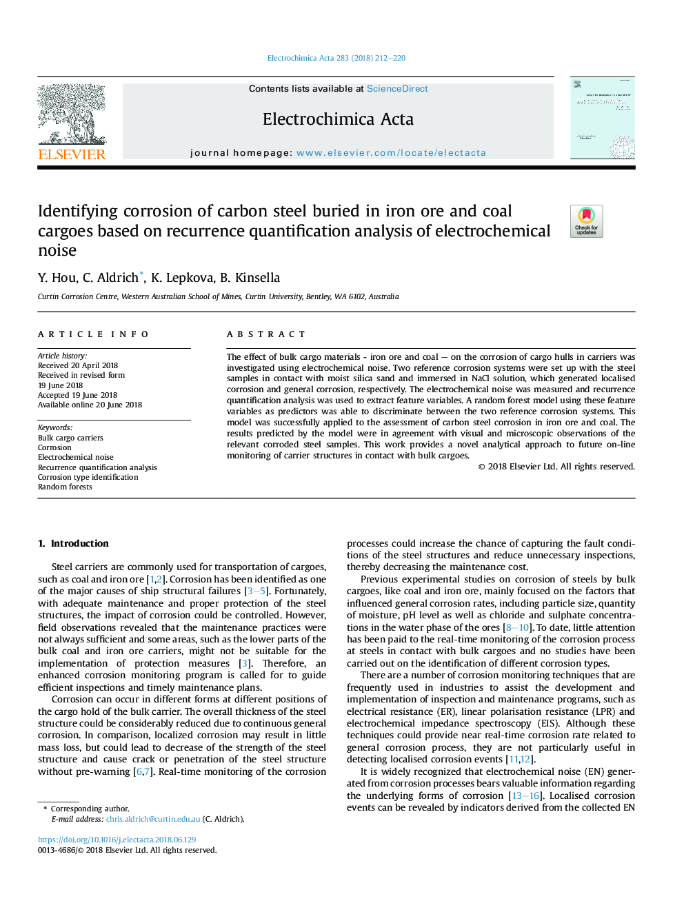 Identifying corrosion of carbon steel buried in iron ore and coal cargoes based on recurrence quantification analysis of electrochemical noise