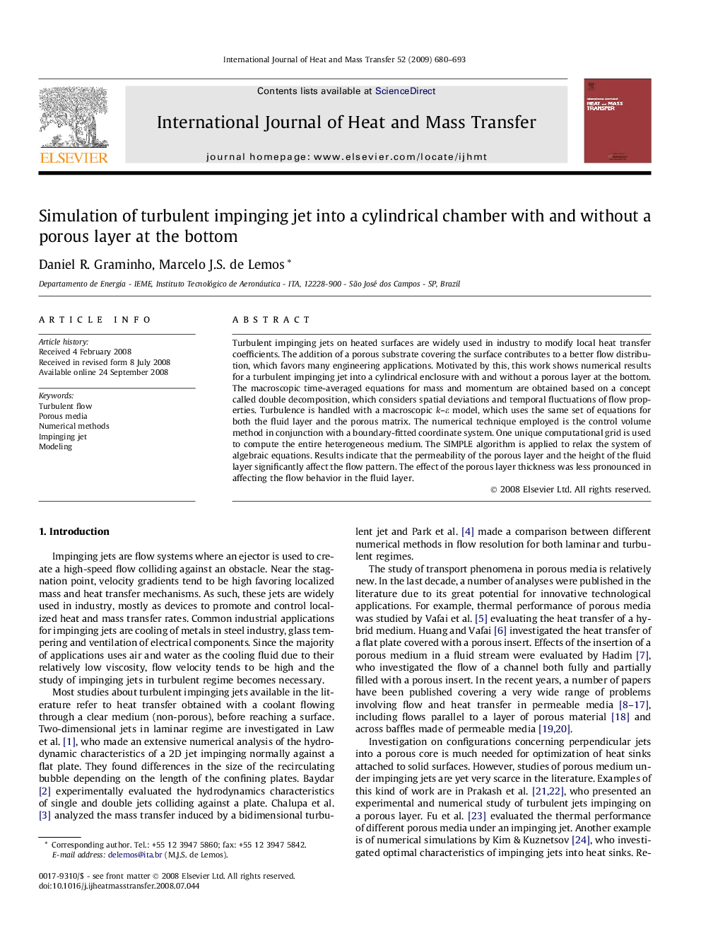 Simulation of turbulent impinging jet into a cylindrical chamber with and without a porous layer at the bottom