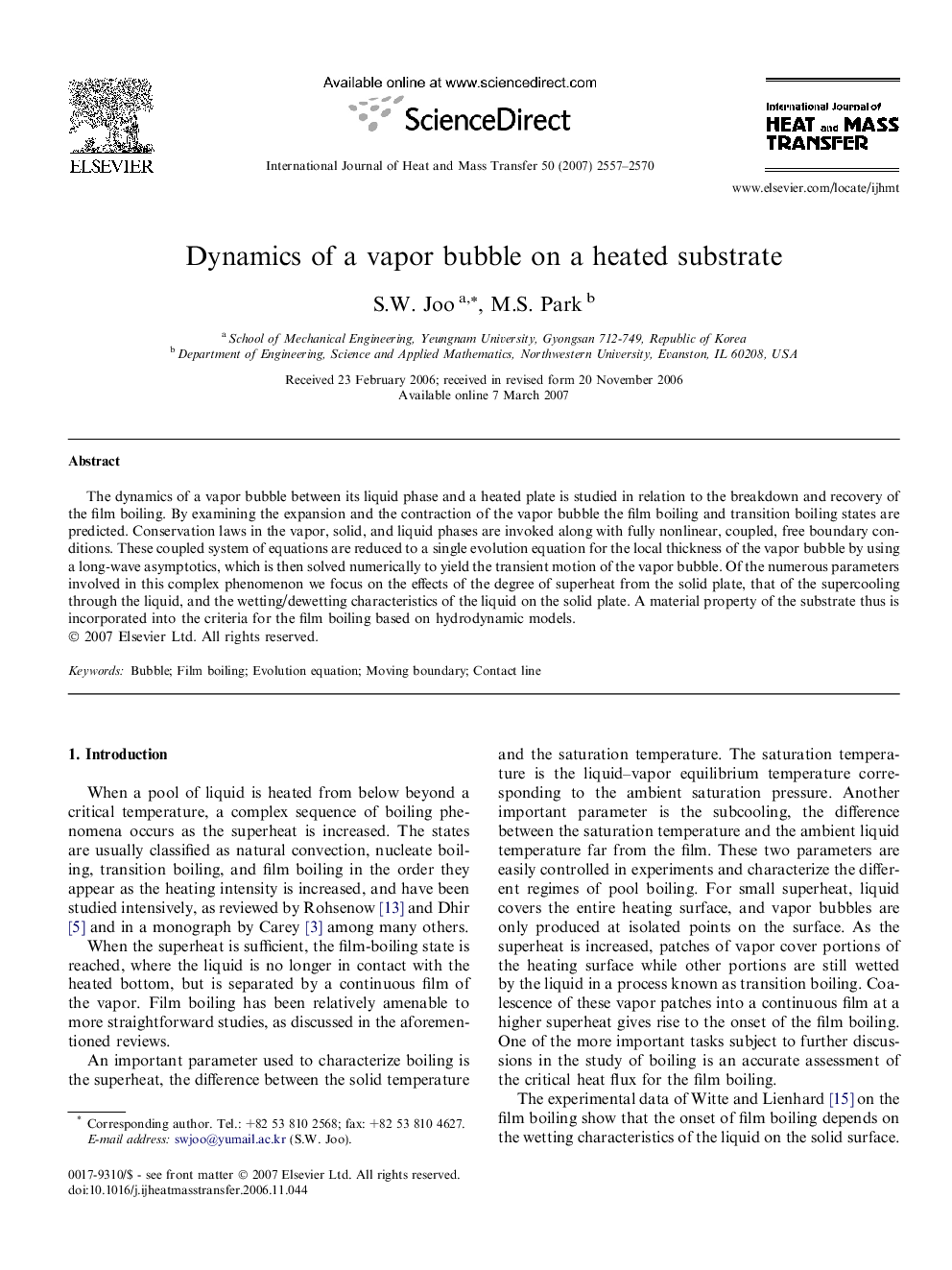 Dynamics of a vapor bubble on a heated substrate