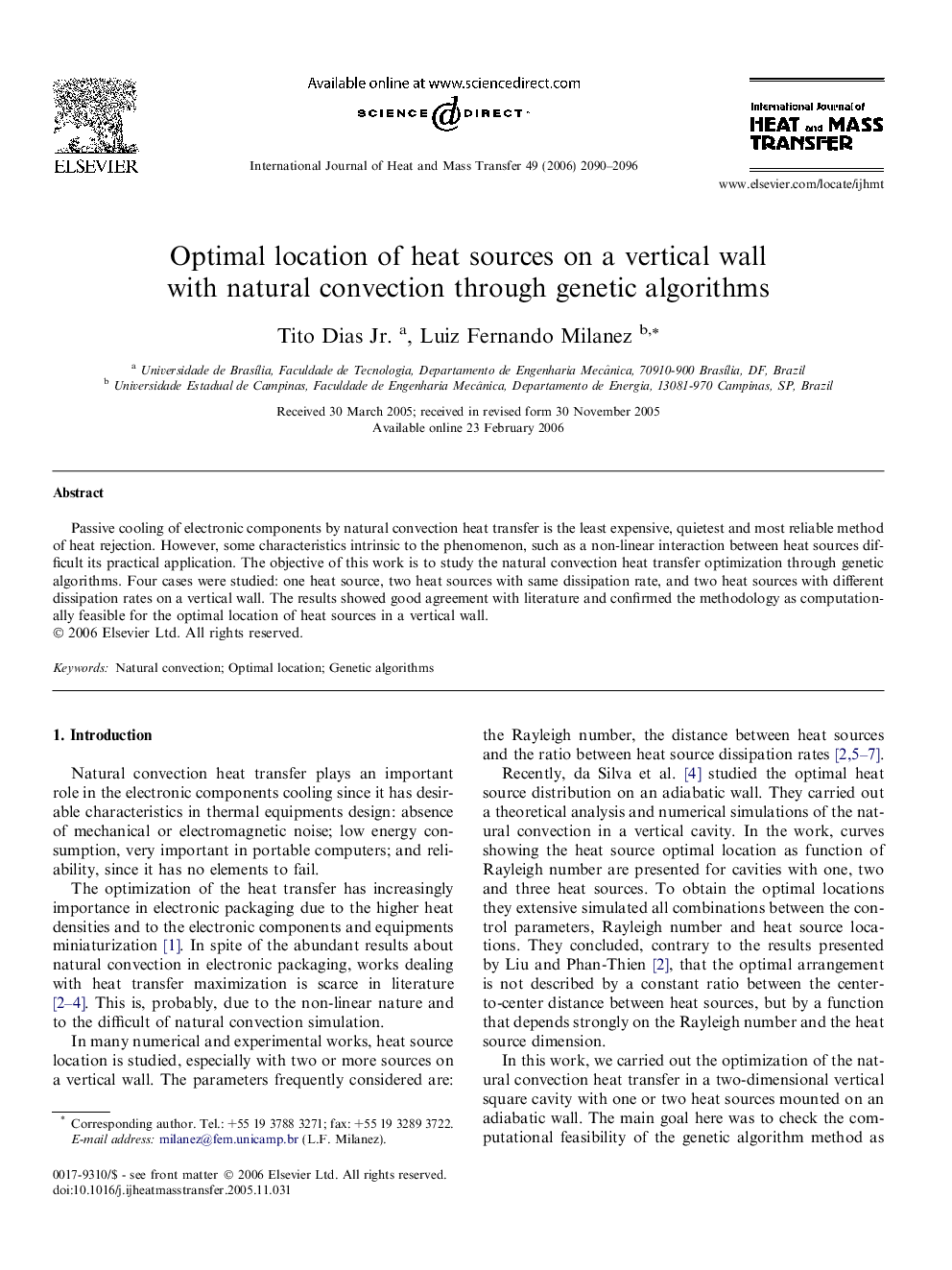 Optimal location of heat sources on a vertical wall with natural convection through genetic algorithms