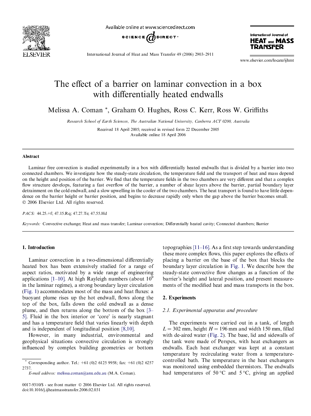 The effect of a barrier on laminar convection in a box with differentially heated endwalls