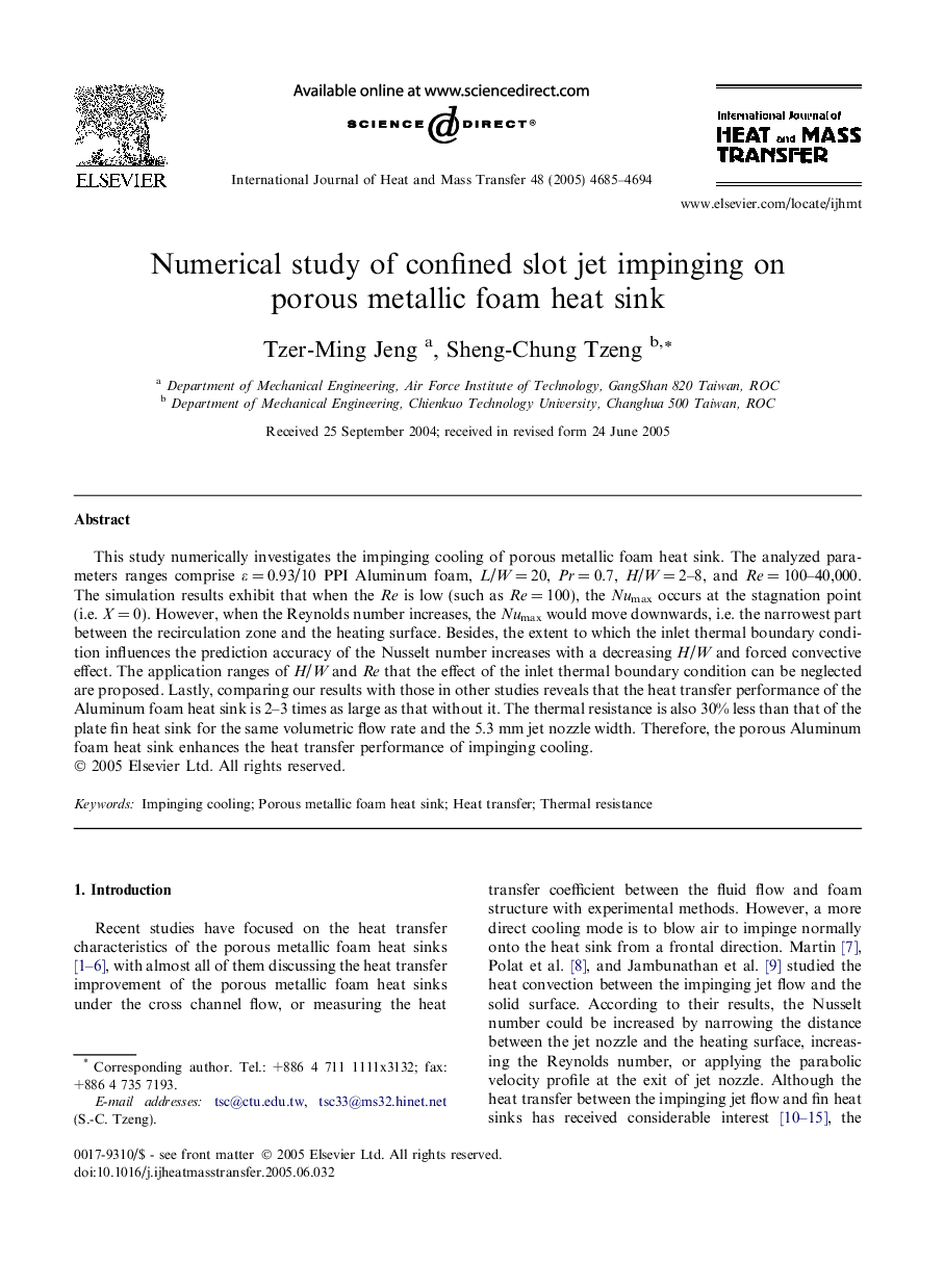 Numerical study of confined slot jet impinging on porous metallic foam heat sink