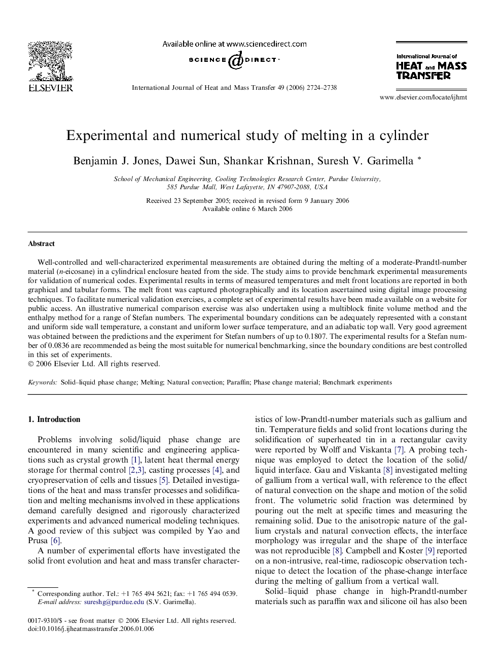 Experimental and numerical study of melting in a cylinder