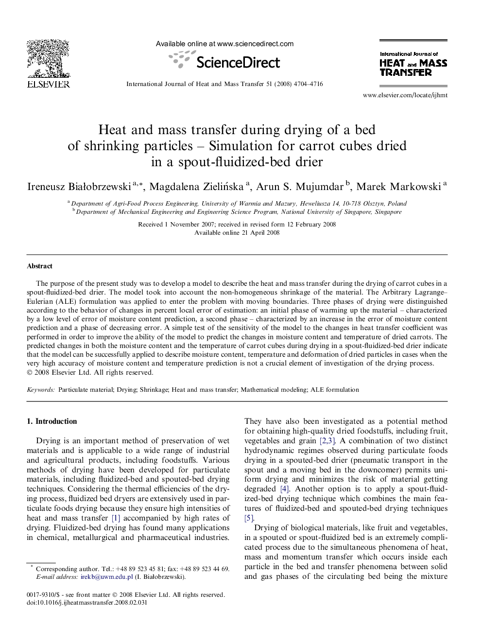 Heat and mass transfer during drying of a bed of shrinking particles – Simulation for carrot cubes dried in a spout-fluidized-bed drier