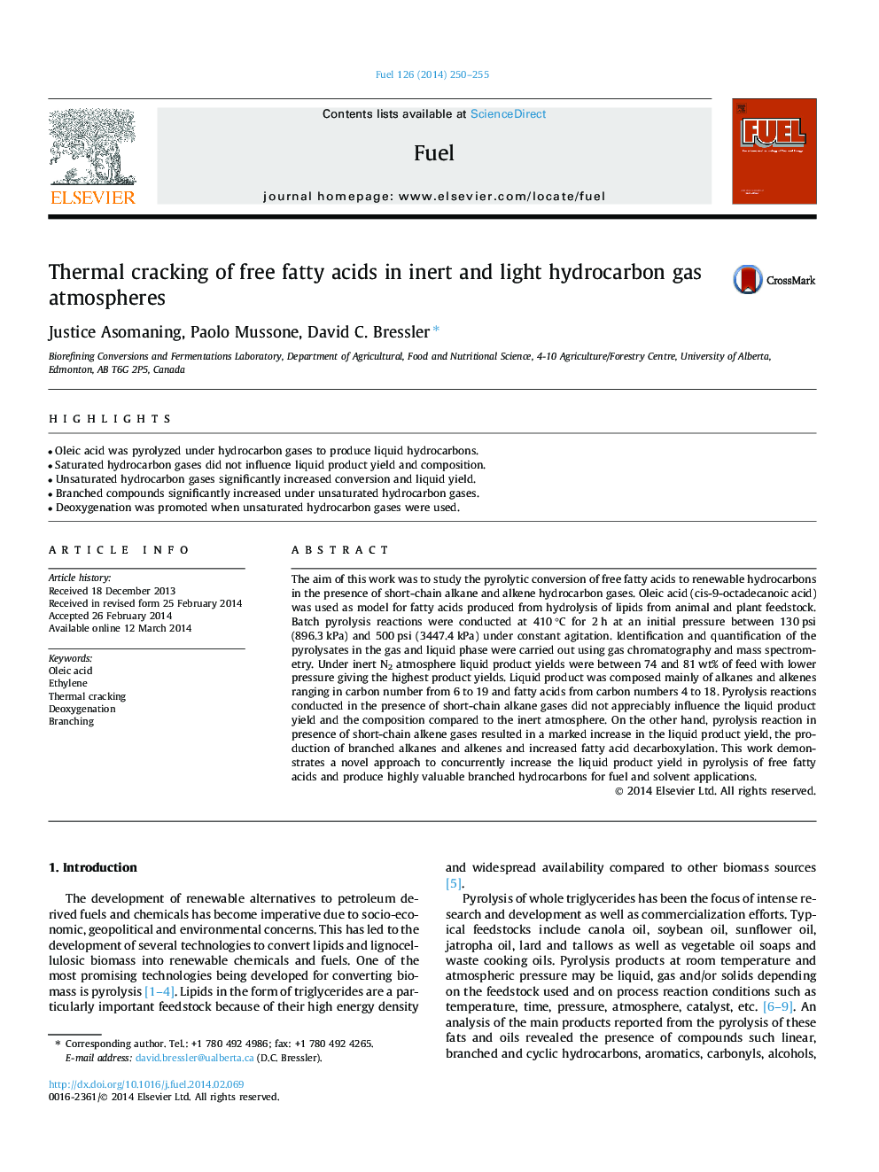 Thermal cracking of free fatty acids in inert and light hydrocarbon gas atmospheres