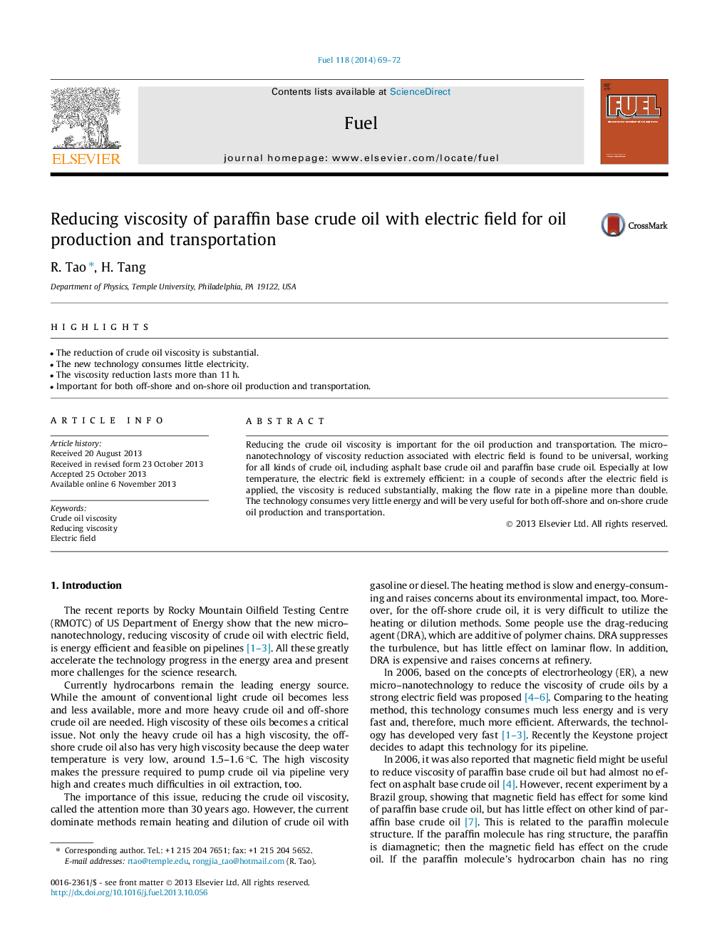 Reducing viscosity of paraffin base crude oil with electric field for oil production and transportation