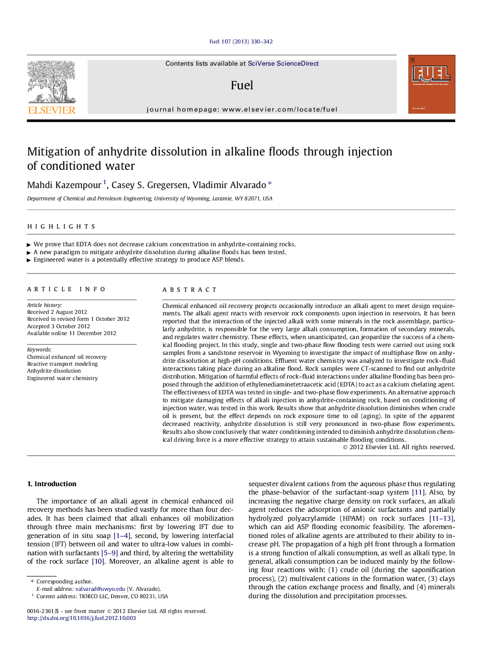 Mitigation of anhydrite dissolution in alkaline floods through injection of conditioned water