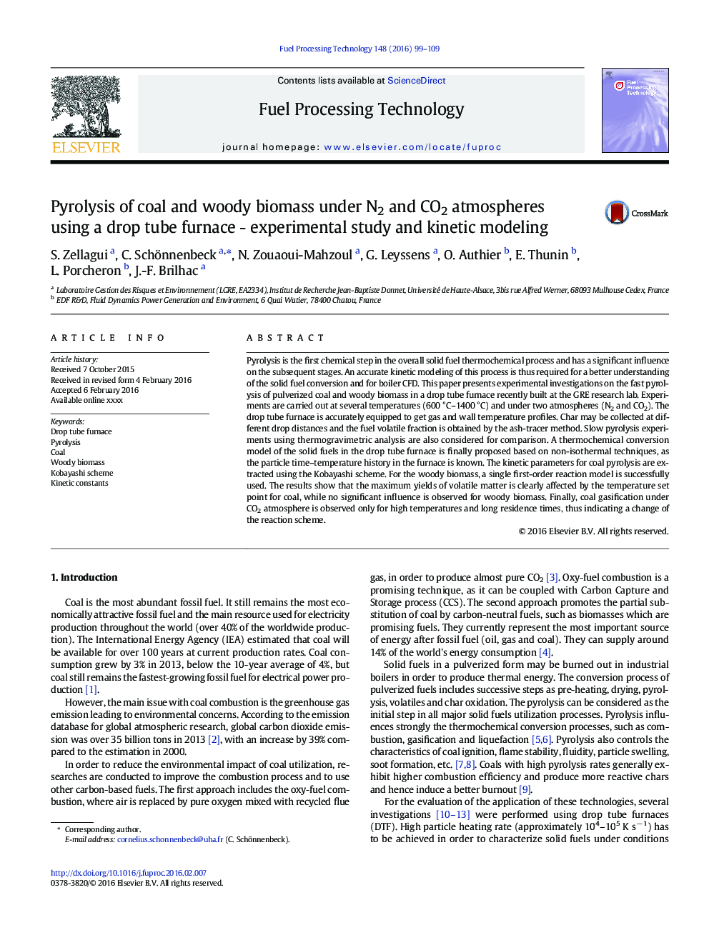 Pyrolysis of coal and woody biomass under N2 and CO2 atmospheres using a drop tube furnace - experimental study and kinetic modeling