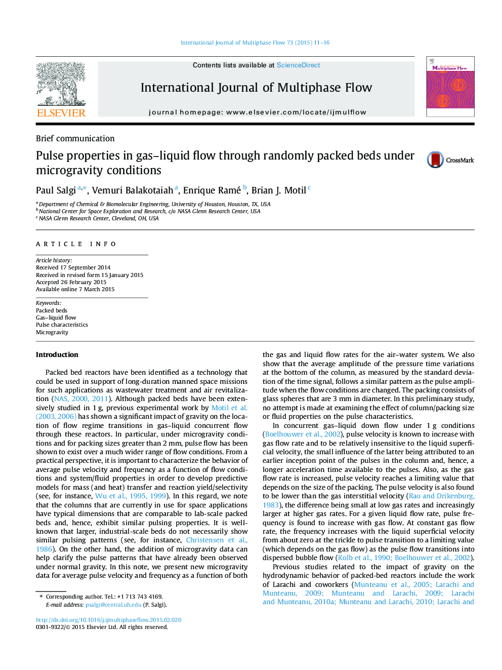 Pulse properties in gas–liquid flow through randomly packed beds under microgravity conditions