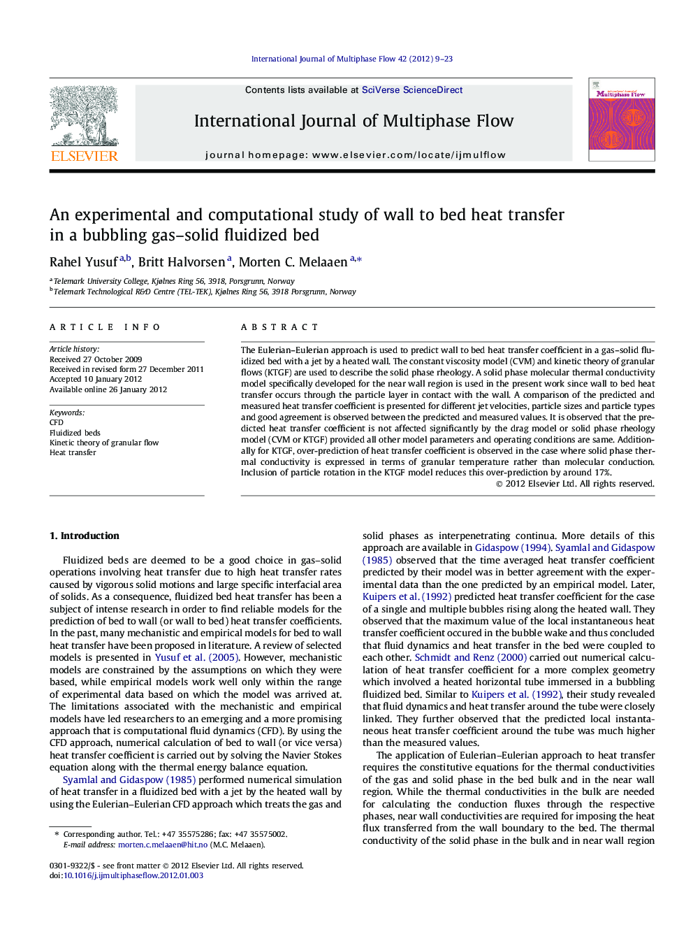 An experimental and computational study of wall to bed heat transfer in a bubbling gas–solid fluidized bed