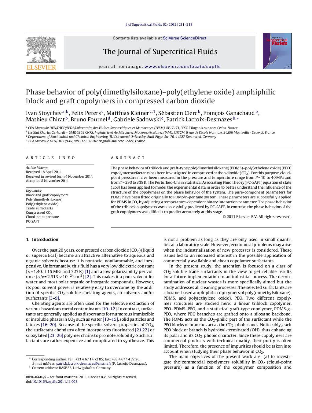 Phase behavior of poly(dimethylsiloxane)-poly(ethylene oxide) amphiphilic block and graft copolymers in compressed carbon dioxide