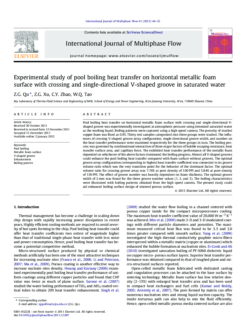 Experimental study of pool boiling heat transfer on horizontal metallic foam surface with crossing and single-directional V-shaped groove in saturated water