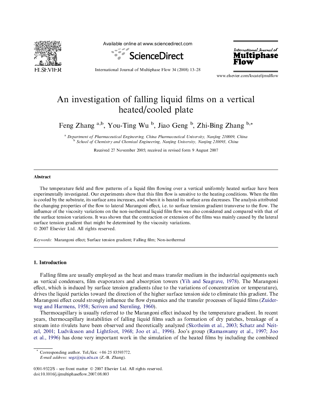 An investigation of falling liquid films on a vertical heated/cooled plate