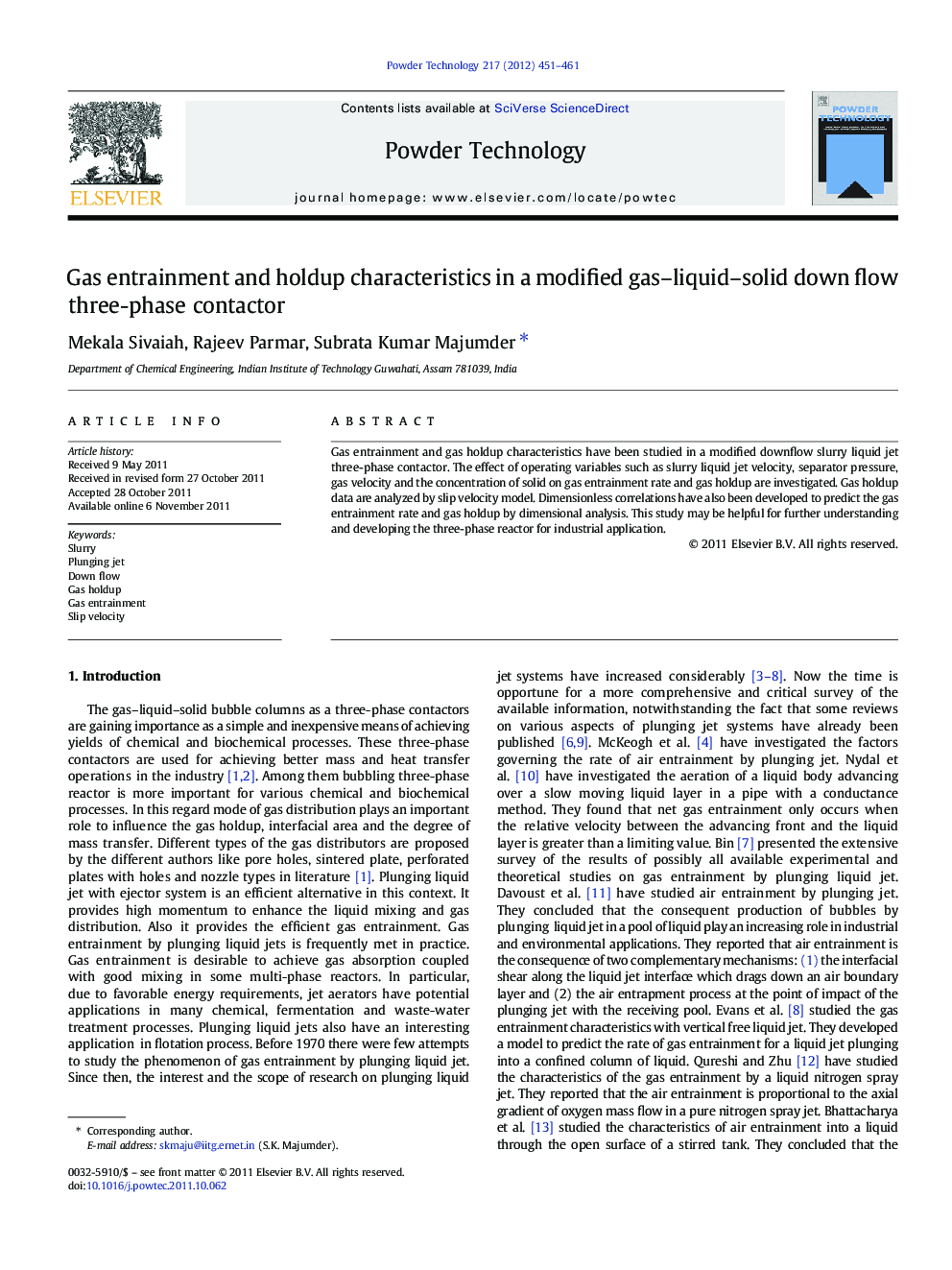 Gas entrainment and holdup characteristics in a modified gas-liquid-solid down flow three-phase contactor