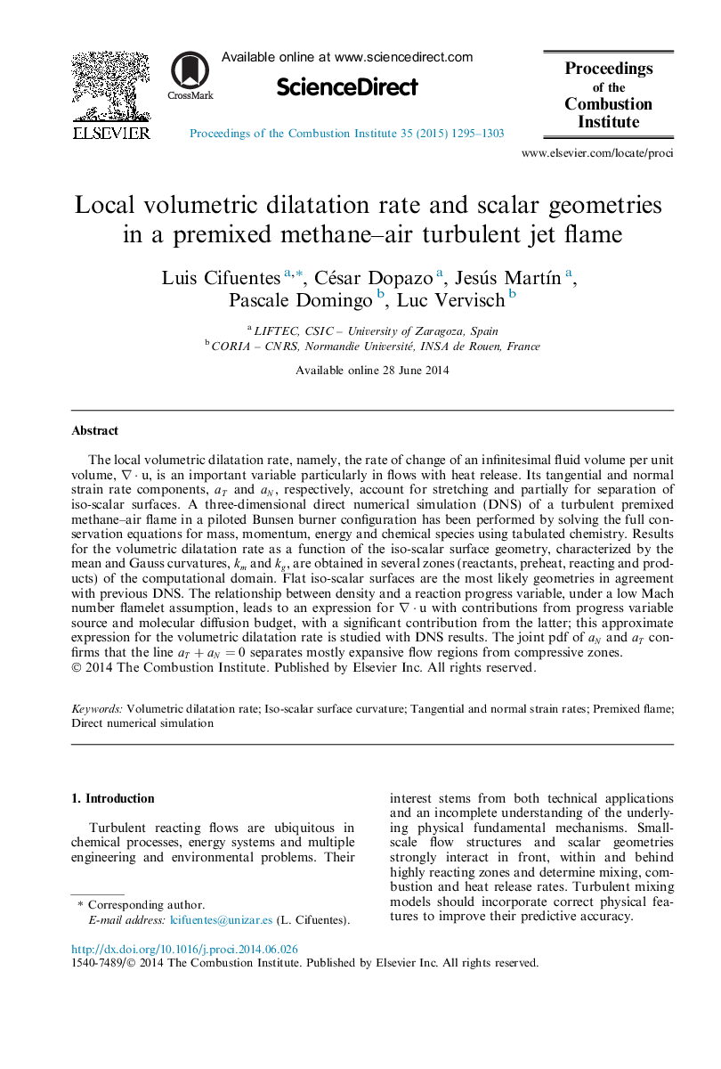 Local volumetric dilatation rate and scalar geometries in a premixed methane-air turbulent jet flame