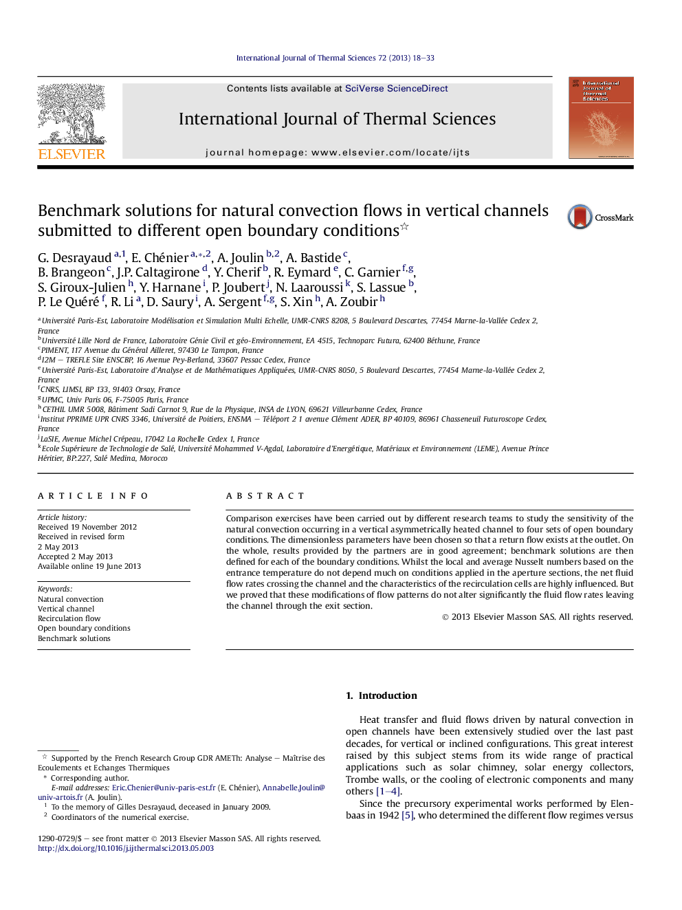 Benchmark solutions for natural convection flows in vertical channels submitted to different open boundary conditions