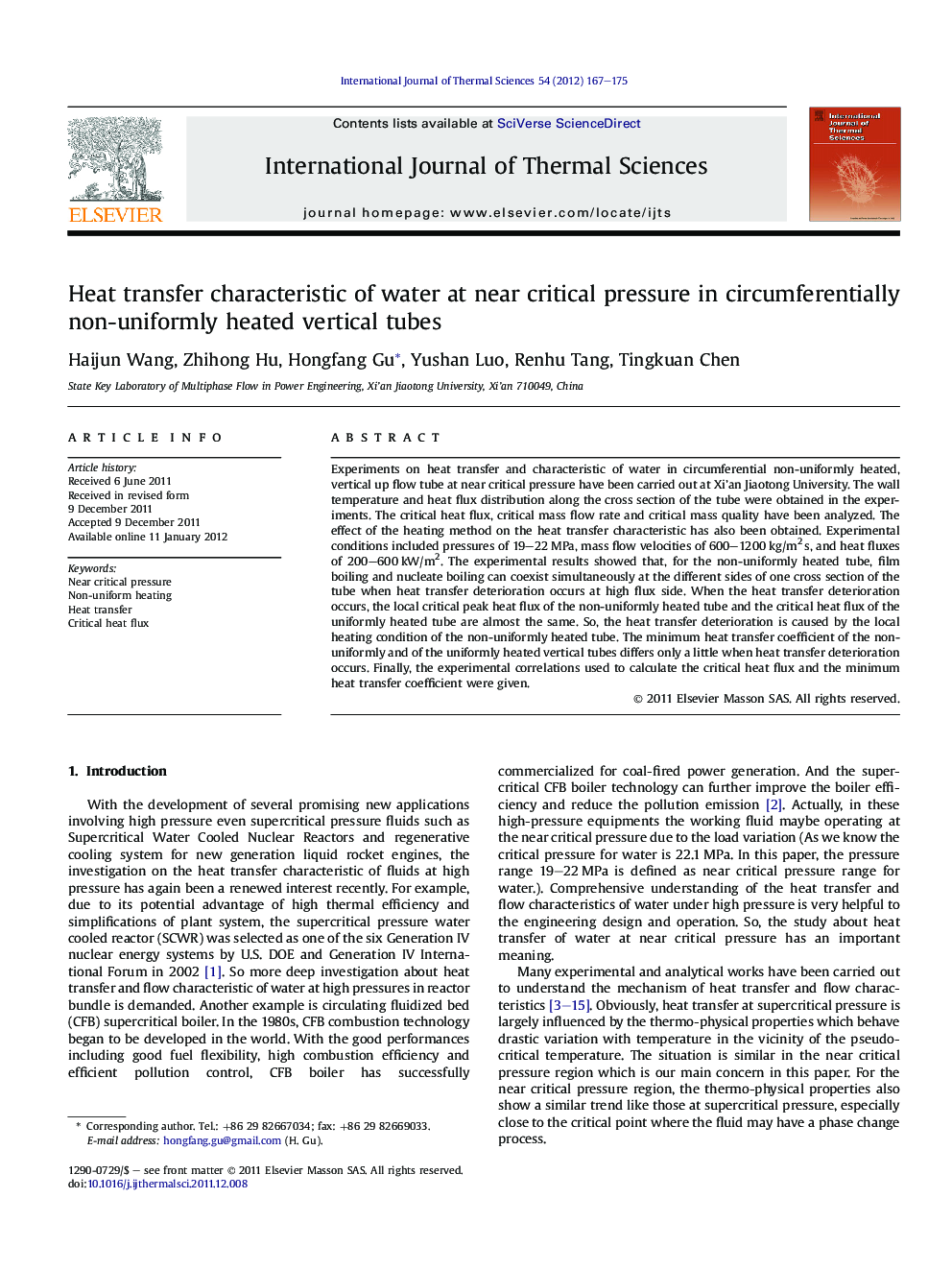 Heat transfer characteristic of water at near critical pressure in circumferentially non-uniformly heated vertical tubes