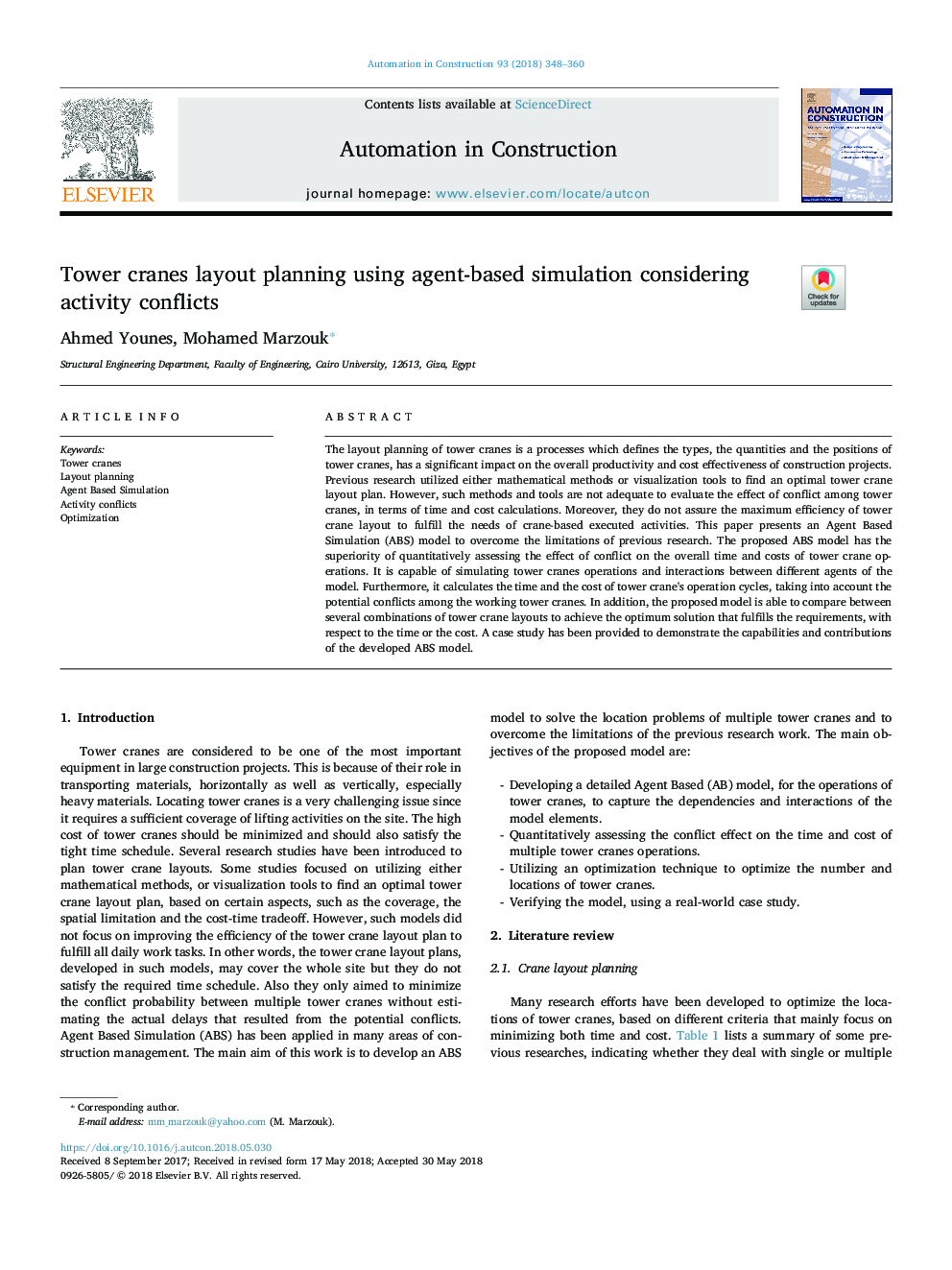 Tower cranes layout planning using agent-based simulation considering activity conflicts