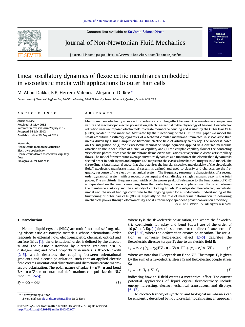 Linear oscillatory dynamics of flexoelectric membranes embedded in viscoelastic media with applications to outer hair cells