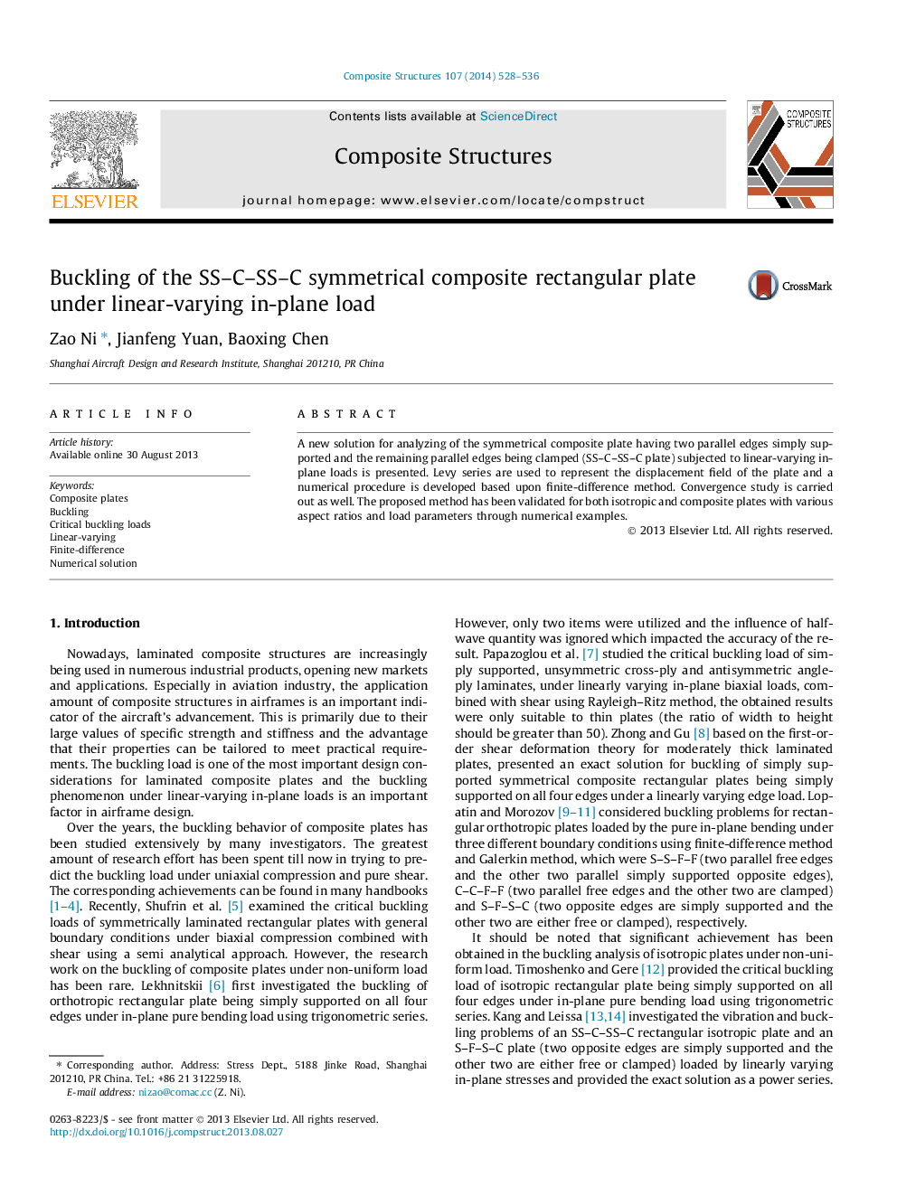 Buckling of the SS-C-SS-C symmetrical composite rectangular plate under linear-varying in-plane load