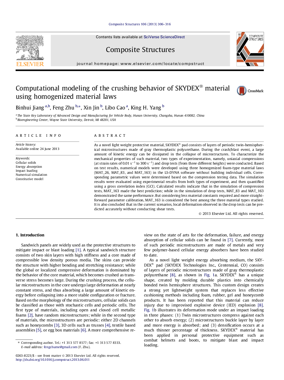 Computational modeling of the crushing behavior of SKYDEX® material using homogenized material laws