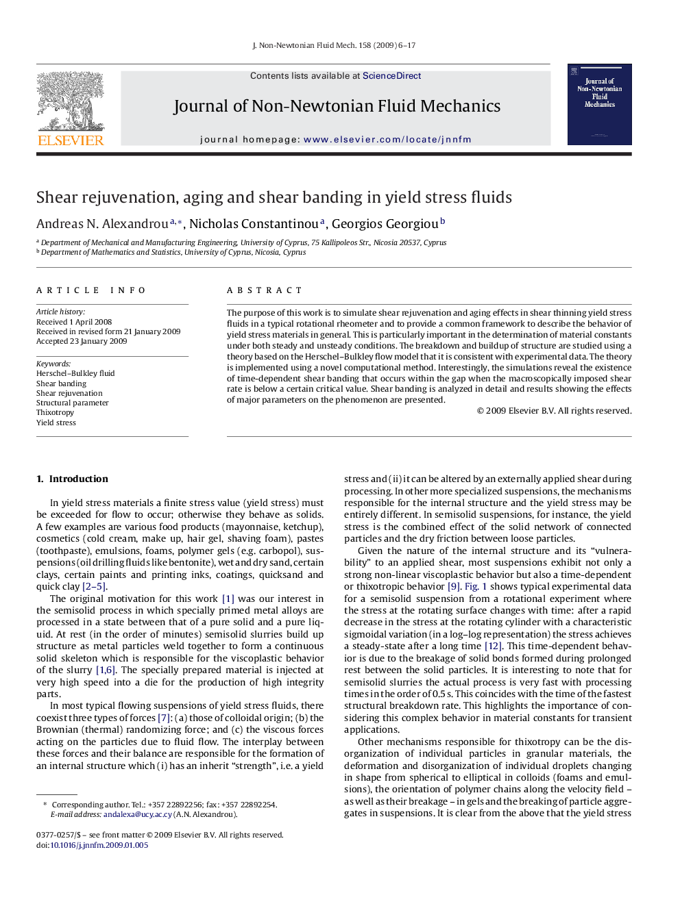 Shear rejuvenation, aging and shear banding in yield stress fluids