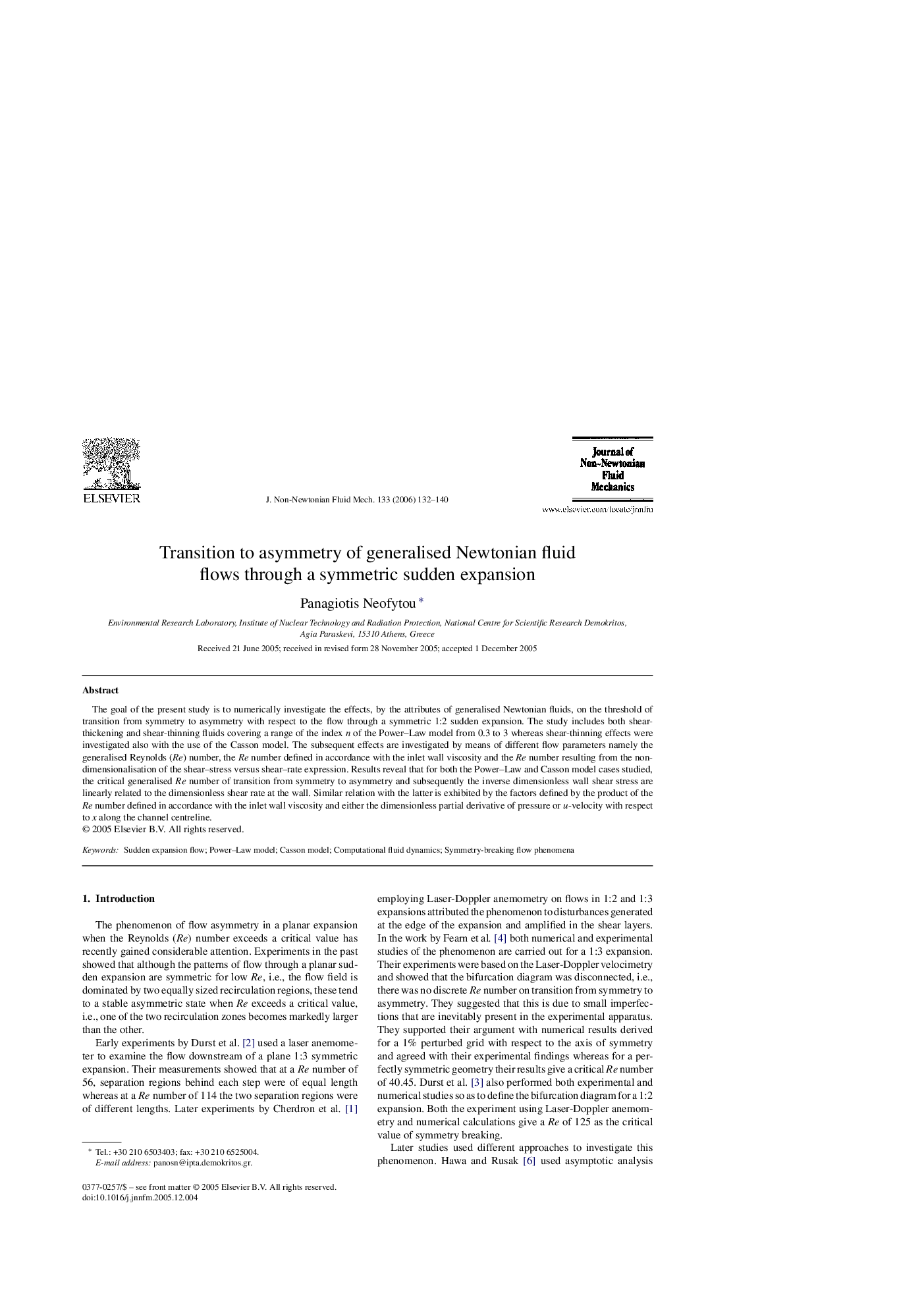 Transition to asymmetry of generalised Newtonian fluid flows through a symmetric sudden expansion