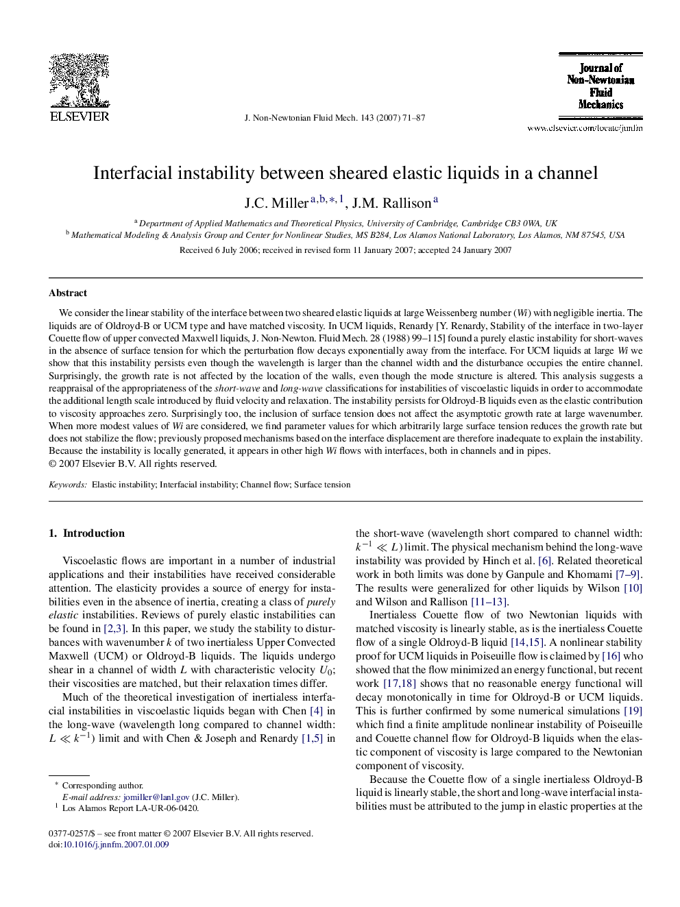 Interfacial instability between sheared elastic liquids in a channel