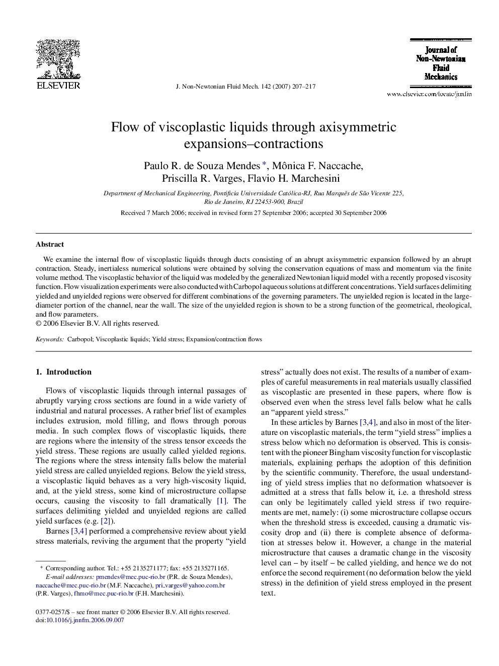 Flow of viscoplastic liquids through axisymmetric expansions–contractions