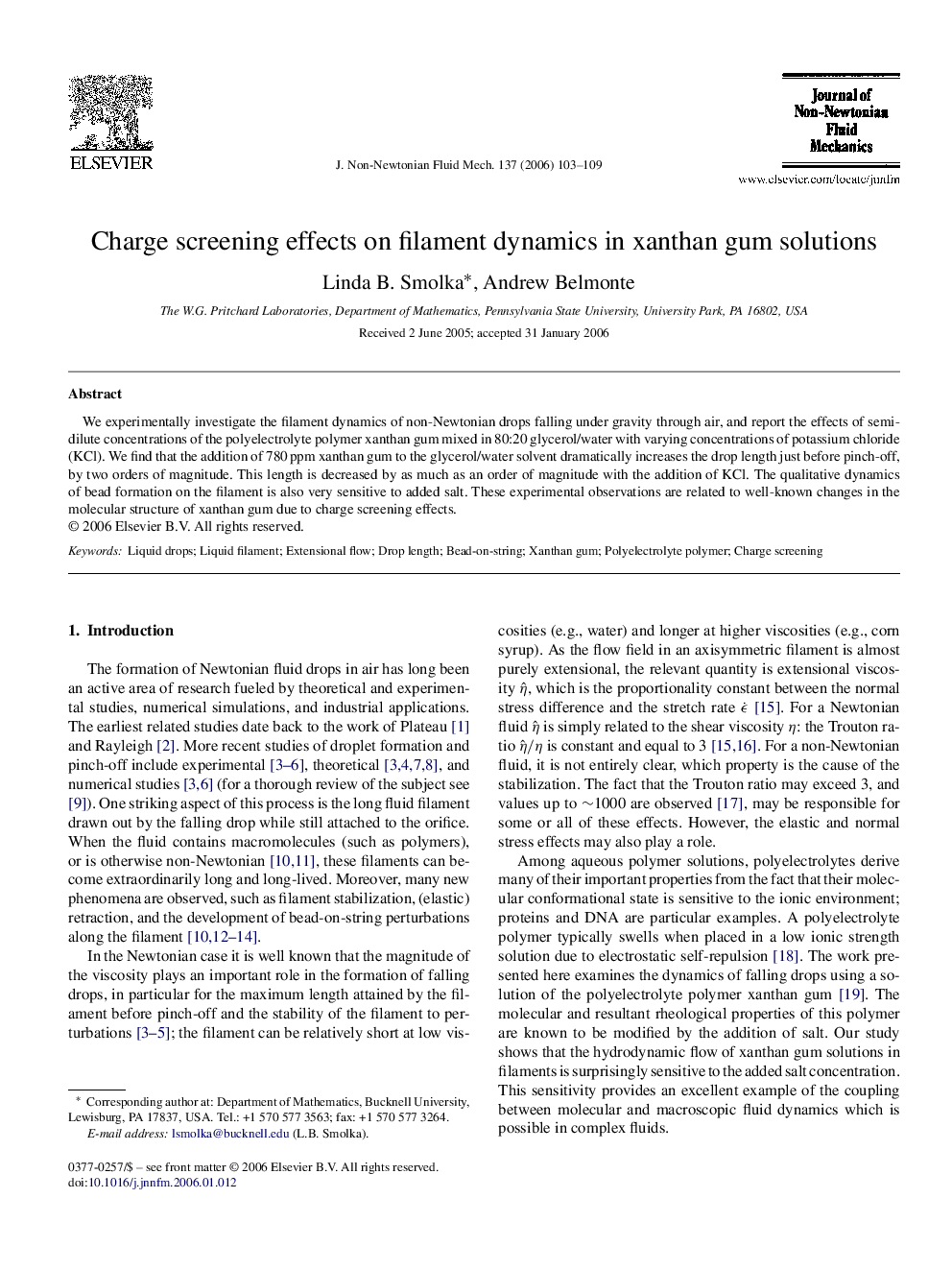 Charge screening effects on filament dynamics in xanthan gum solutions