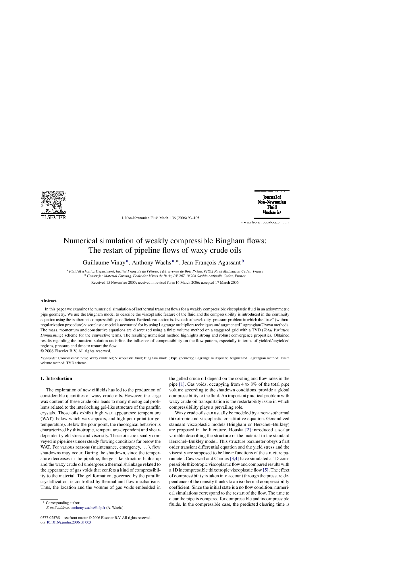 Numerical simulation of weakly compressible Bingham flows: The restart of pipeline flows of waxy crude oils