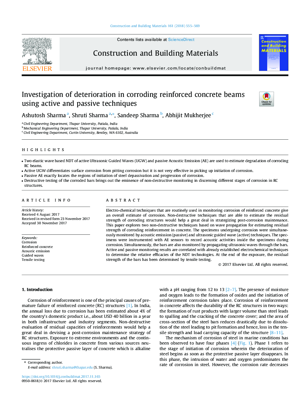 Investigation of deterioration in corroding reinforced concrete beams using active and passive techniques