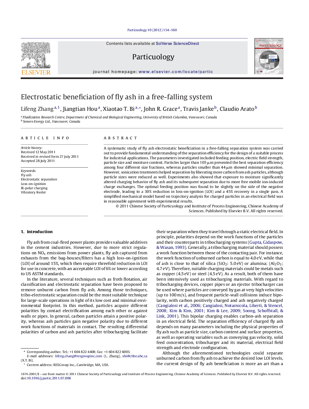 Electrostatic beneficiation of fly ash in a free-falling system