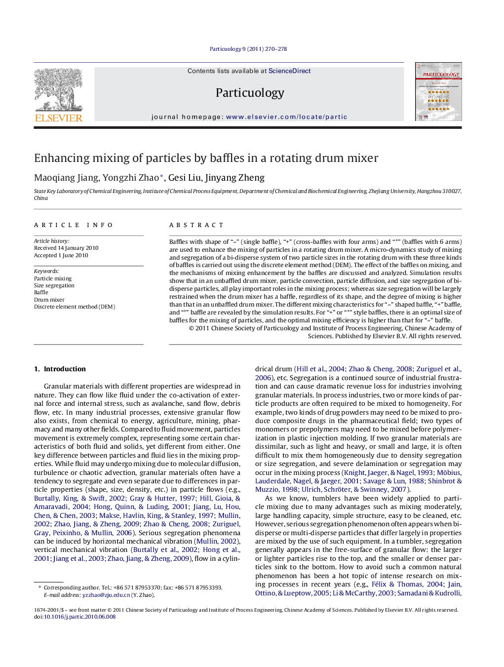 Enhancing mixing of particles by baffles in a rotating drum mixer