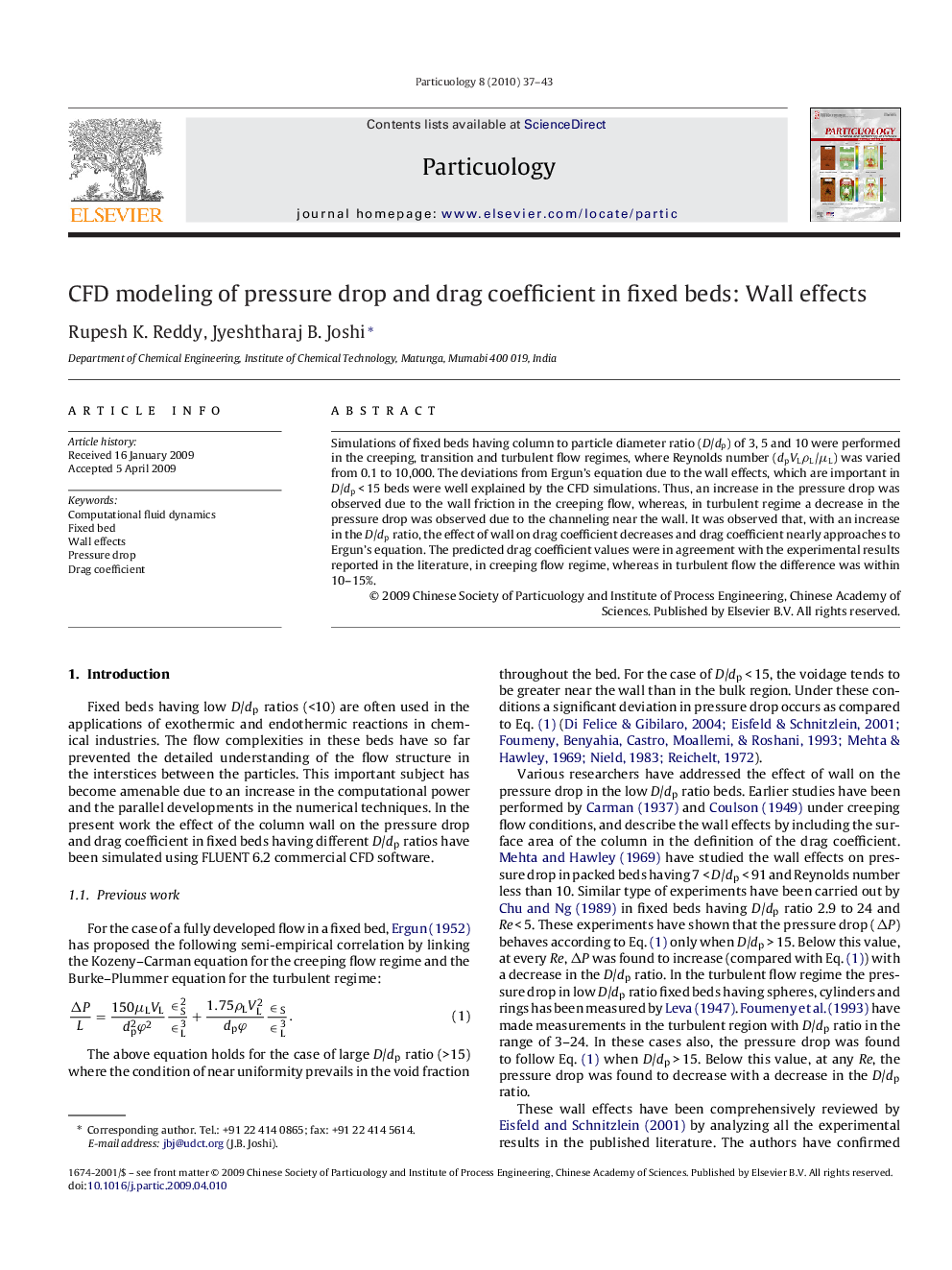 CFD modeling of pressure drop and drag coefficient in fixed beds: Wall effects