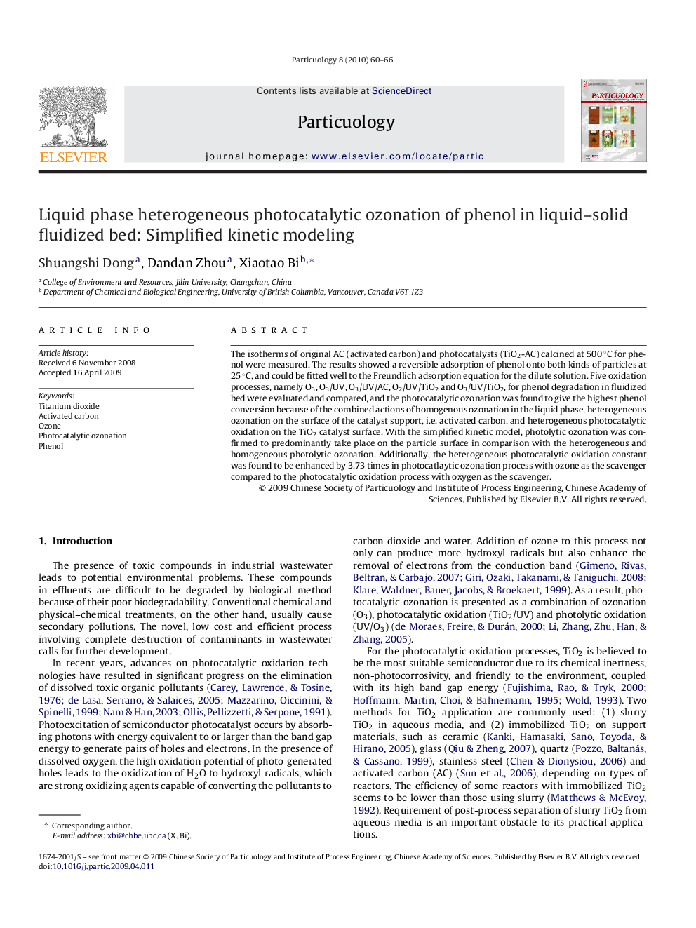 Liquid phase heterogeneous photocatalytic ozonation of phenol in liquid–solid fluidized bed: Simplified kinetic modeling