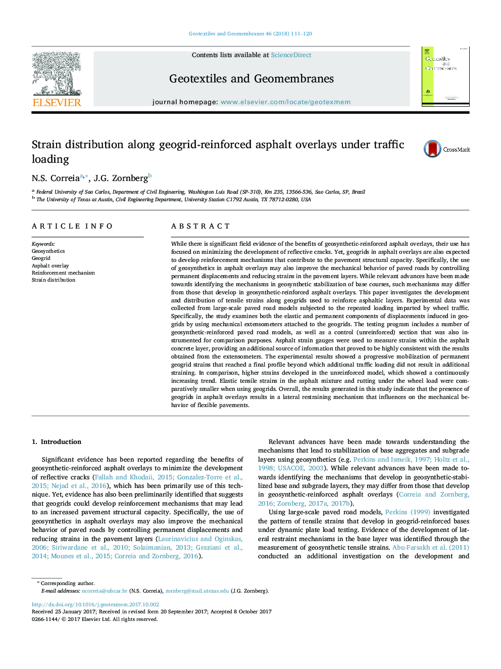 Strain distribution along geogrid-reinforced asphalt overlays under traffic loading